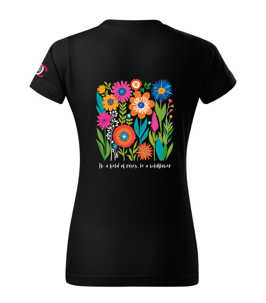 Black floral T-shirt with text saying In a field of roses be a wildflower